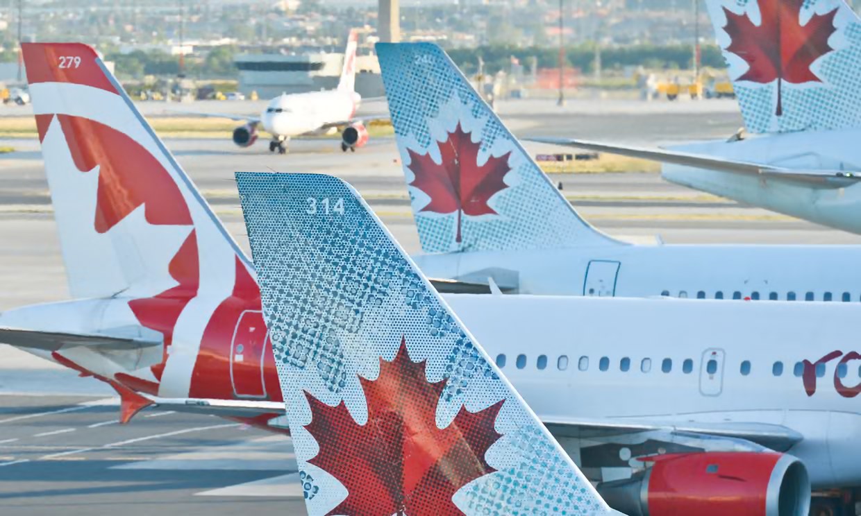 Air Canada and Air Canada Rouge aircraft tails on the tarmac